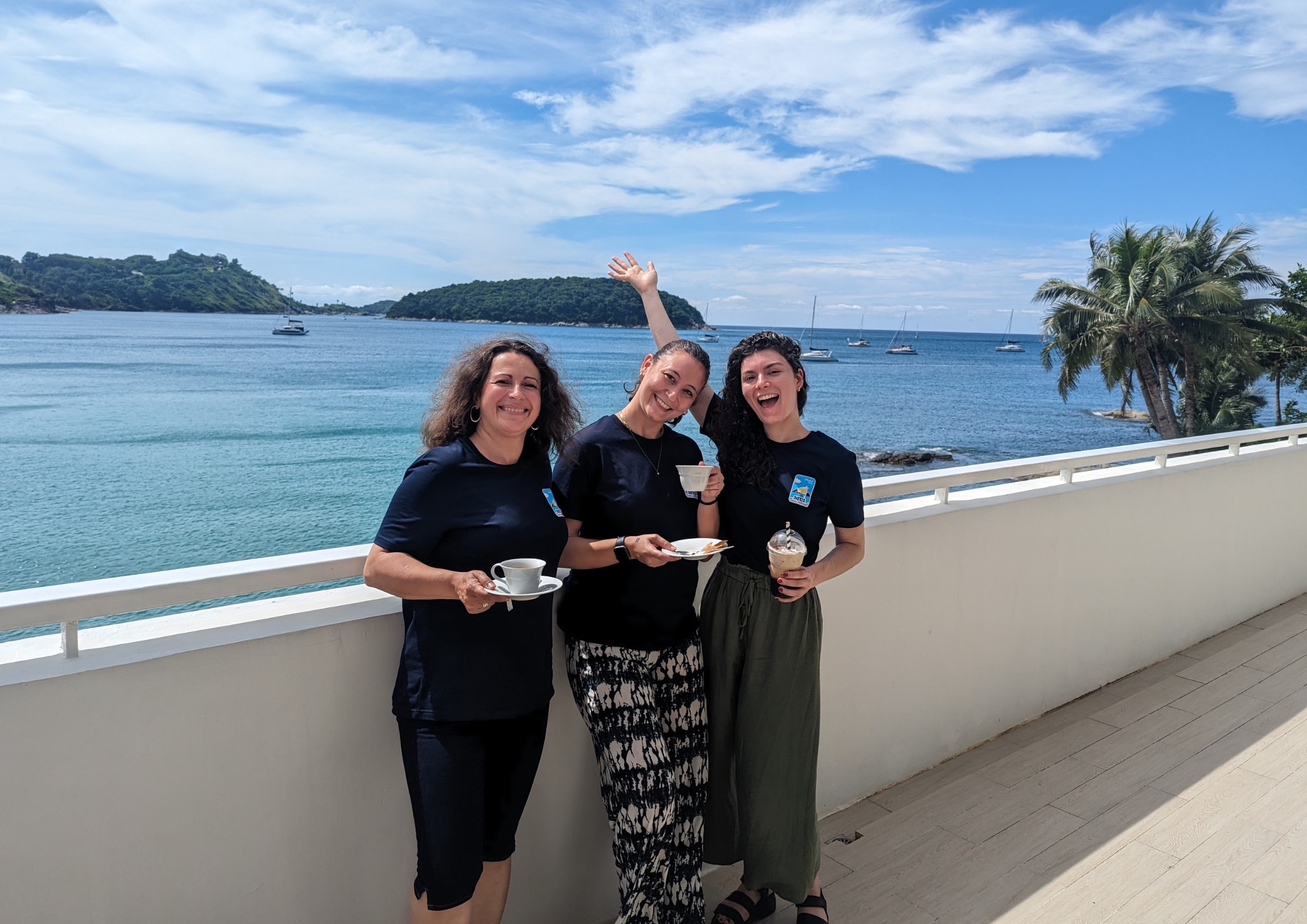 Tina, Raffaella, and Mikaila enjoy a catered coffee break on the terrace between work sessions.
